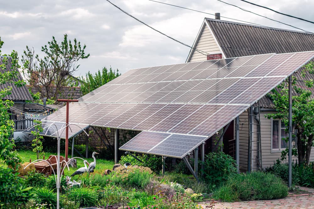 Technicians installing solar panels on rooftop
